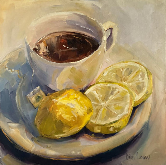 Tea cup with lemons