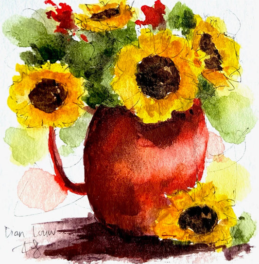 Sunflowers in big red vase